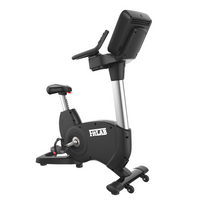 Black spin workout bicycle exercise bike with digital display on a white background