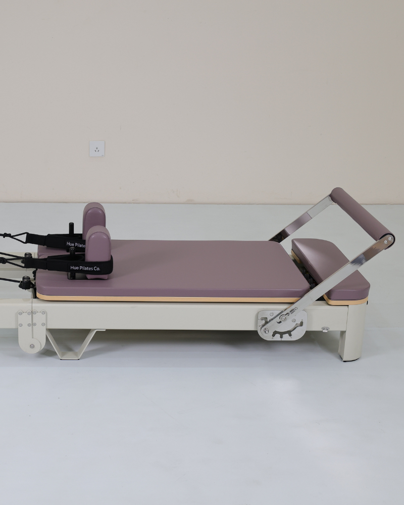 Foldable Hue Pilates Reformer Machine in Mauve