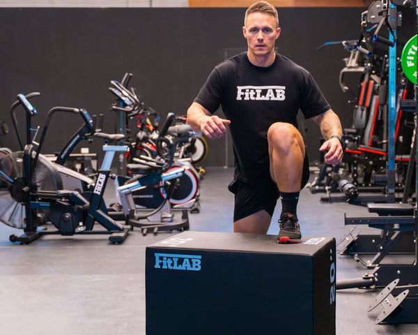 The cardio section features treadmills, rowing machines, and exercise bikes, providing a comprehensive selection for both home and commercial gyms.