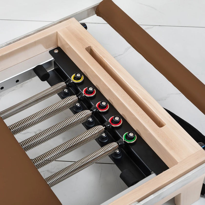 Shop the Contour Pilates Reformer in Espresso. Compact, foldable design with adjustable springs & accessories. Perfect for home workouts.
