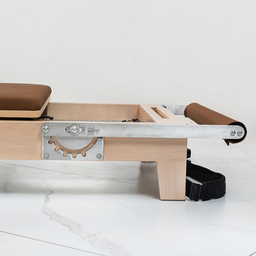 Shop the Contour Pilates Reformer in Espresso. Compact, foldable design with adjustable springs & accessories. Perfect for home workouts.