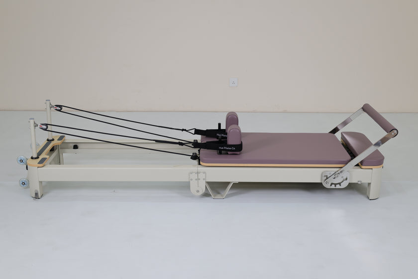 Foldable Hue Pilates Reformer Machine in Mauve
